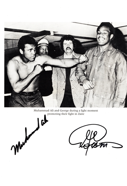ALI V. FORMAN ZAIRE FIGHT PAGE SIGNED BY MUHAMMAD ALI & GEORGE FORMAN