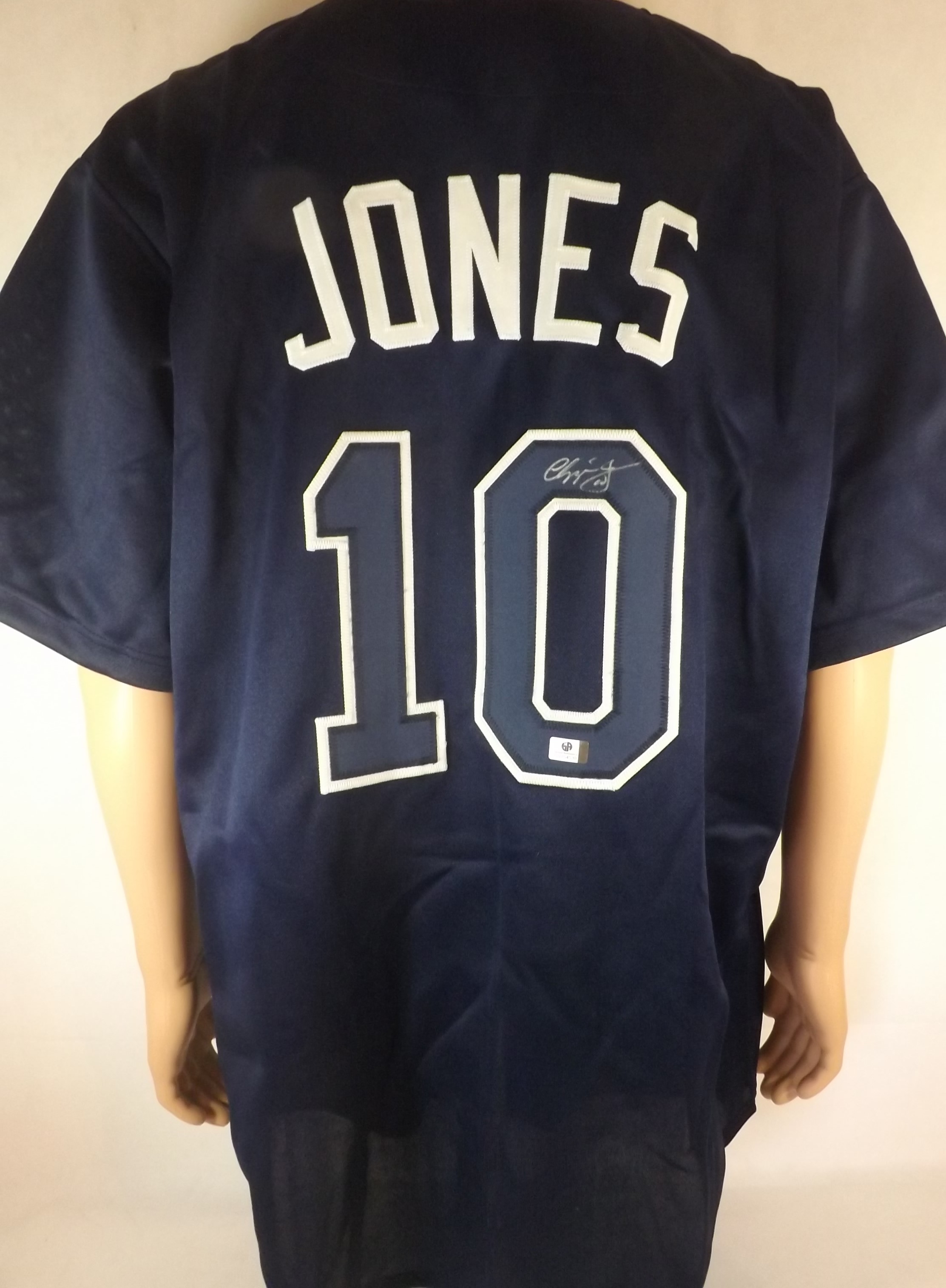 Braves Chipper Jones Signature Jersey T-Shirt from Homage. | Navy | Vintage Apparel from Homage.